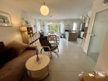 Wohnen/Essen Hochwertige Erdgeschosswohnung mit Terrasse und Garten in exklusiver Wohnlage!